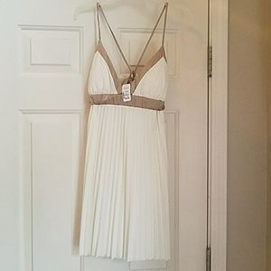 Cream and gold pleated spaghetti strap dress